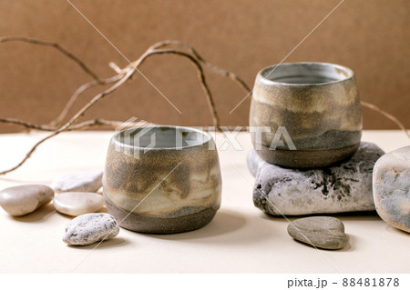 Set of empty grey ceramic cups 88481878