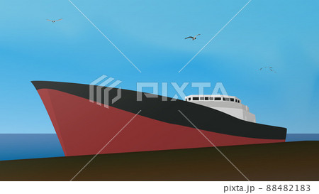 Large cargo ship at the pier with seagulls flying in the sky. 88482183