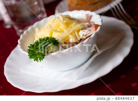traditional Belarusian salad of vegetables, bacon, cheese, and greens. Polessky salad traditional Belarusian salad of vegetables, bacon, cheese, and greens. Polessky salad 88484637