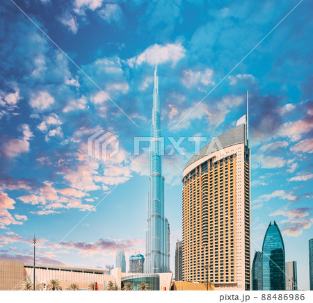 View of hotel Address Dubai Marina, Dubai mall and Burj Khalifa against dramatic sky. View of landmarks of residential district in Dubai Marina. Burj Khalifa, known as the Burj Dubai with a total View of hotel Address Dubai Marina, Dubai mall and Burj Khalifa against dramatic sky. View of landmarks of residential district in Dubai Marina. Burj Khalifa, known as the Burj Dubai with a total 88486986