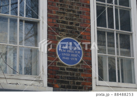 Blue plaque commemorating Sir Carol Reed, London, UK. 88488253