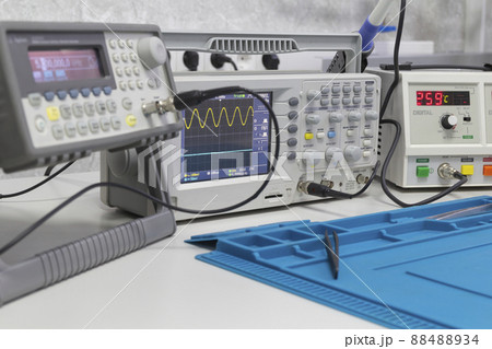 Power supplies and electronic measuring devices in the laboratory 88488934