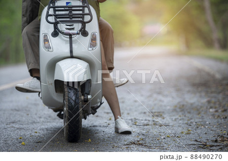 Classic scooter motorbike travel on the nature road 88490270