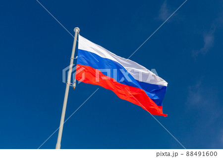 The national flag of Russia is under blue sky 88491600