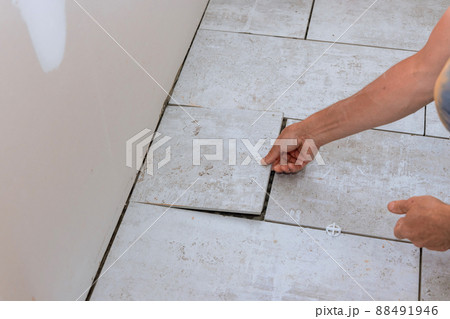 Laying floor ceramic tile renovating the house 88491946