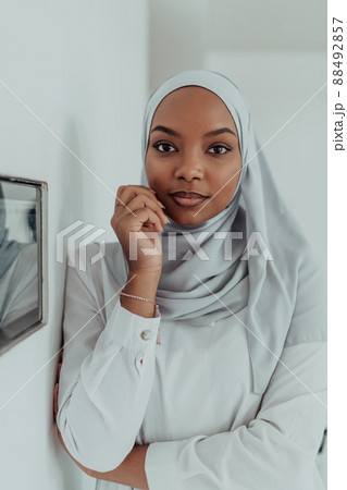 African woman using smart home screen control system 88492857