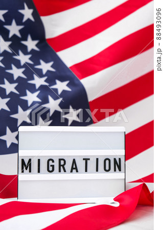 American flag. Lightbox with text MIGRATION Flag of the united states of America. July 4th Independence Day. USA patriotism national holiday. Usa proud. American flag. Lightbox with text MIGRATION Flag of the united states of America. July 4th Independence Day. USA patriotism national holiday. Usa proud. 88493096