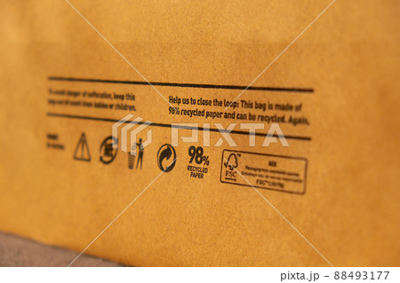 Recycling bag Closeup view of pap sign and other eco-label on Brown paper bag that is 100 recyclable and reusable spbd. Symbol indicates paper and cardboard. Concept Recycling bag Closeup view of pap sign and other eco-label on Brown paper bag that is 100 recyclable and reusable spbd. Symbol indicates paper and cardboard. Concept 88493177