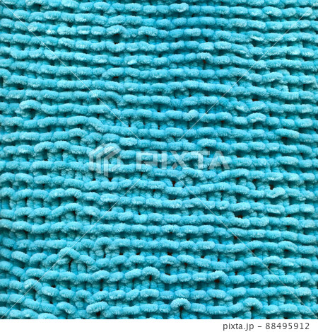 Handmade knitted fabric turquoise wool background texture Handmade knitted fabric turquoise wool background texture 88495912
