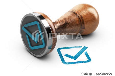 Check mark and rubber stamp over white background. 88506959