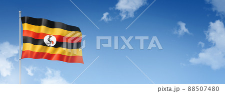 Uganda flag isolated on a blue sky. Horizontal banner Uganda flag isolated on a blue sky. Horizontal banner 88507480