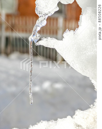 Clear icicle on a sunny day in the spring. Clear icicle on a sunny day in the spring. 88508226