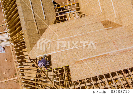 Builder on working a new roof in unfinished house 88508719