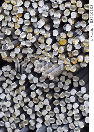 Metal profile of round section in packs at the warehouse of metal products 88510132