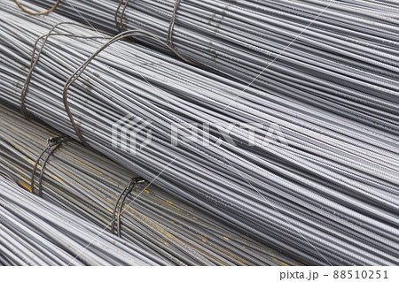 Reinforcing bars with a periodic profile in the packs are stored in the metal products warehouse Reinforcing bars with a periodic profile in the packs are stored in the metal products warehouse 88510251