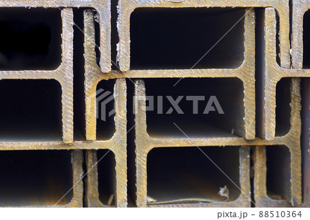 Metal profile beam in packs at the warehouse of metal products Metal profile beam in packs at the warehouse of metal products 88510364