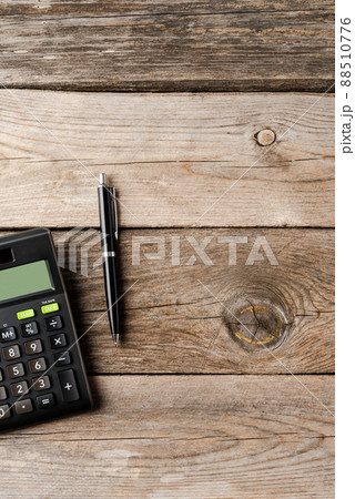 Business background with calculator and pen. Office desktop Business background with calculator and pen. Office desktop 88510776
