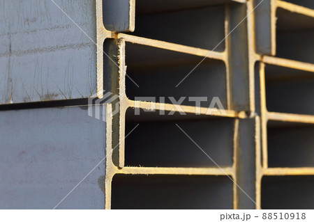 Metal profile beam in packs at the warehouse of metal products Metal profile beam in packs at the warehouse of metal products 88510918