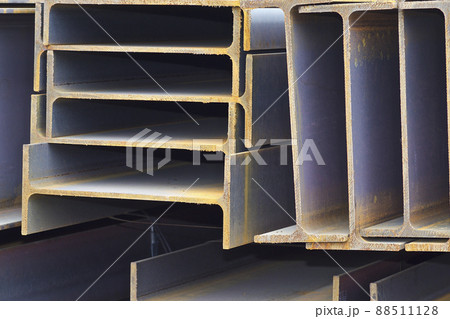 Metal profile beam in packs at the warehouse of metal products Metal profile beam in packs at the warehouse of metal products 88511128