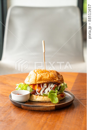 beef burger with cheese and sauce 88511657