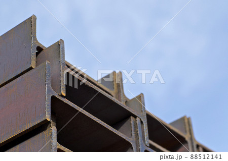 Metal profile beam in packs at the warehouse of metal products 88512141
