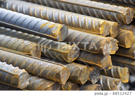 Reinforcing bars with a periodic profile in the packs are stored in the metal products warehouse Reinforcing bars with a periodic profile in the packs are stored in the metal products warehouse 88512427