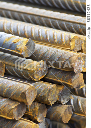 Reinforcing bars with a periodic profile in the packs are stored in the metal products warehouse Reinforcing bars with a periodic profile in the packs are stored in the metal products warehouse 88512428