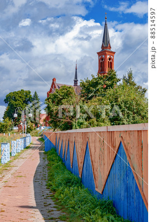 Walking path leading to the Roman Catholic Church of St. Anthony. Postavy, Belarus 88514597