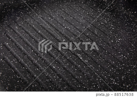 ribbed surface of the pan with black non-stick coating 88517638