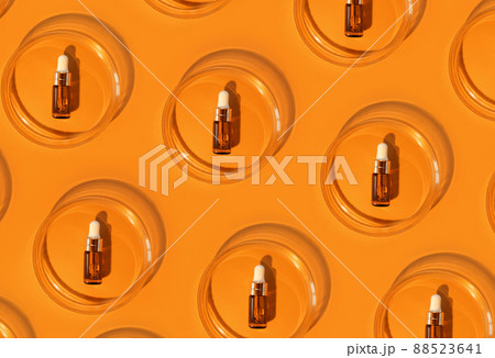 Amber bottle. Laboratory glass petri dish with pipette of water, serum, oil, beauty product. Natural medicine, cosmetic research, bio science. Pattern. Skincare and analysis concept. Dermatology 88523641