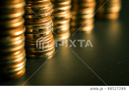 Pile of gold coins stack in finance treasury deposit bank account for saving 88527289