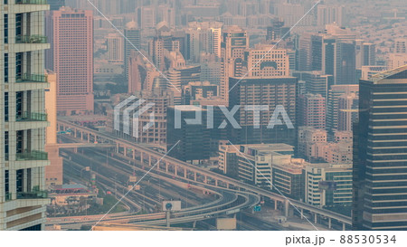 Dubai Aerial view showing al barsha heights and greens district area timelapse 88530534