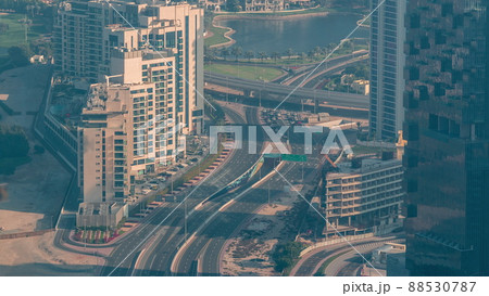 Big crossroad junction between JLT district and Dubai Marina intersected by Sheikh Zayed Road aerial timelapse. Big crossroad junction between JLT district and Dubai Marina intersected by Sheikh Zayed Road aerial timelapse. 88530787