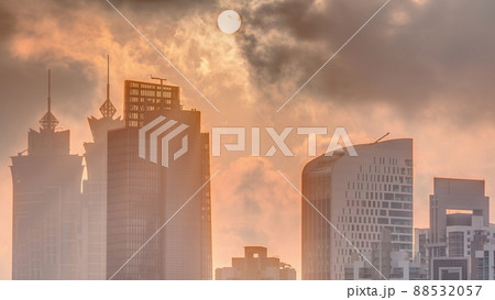 Dubai skyscrapers with golden sunset over business bay district timelapse. 88532057