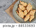 Russian slavic traditional pastry called roguelikes. Cakes bagels. Crispy croissants. Food on grey background, Copy space 88533693