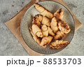 Russian slavic traditional pastry called roguelikes. Cakes bagels. Crispy croissants. Food on grey background, Copy space 88533703