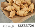 Russian slavic traditional pastry called roguelikes. Cakes bagels. Crispy croissants. Food on grey background, Closeup view 88533729