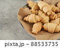 Russian slavic traditional pastry called roguelikes. Cakes bagels. Crispy croissants. Food on grey background, Copy space 88533735