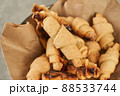 Russian slavic traditional pastry called roguelikes. Cakes bagels. Crispy croissants. Food on grey background, Closeup view 88533744