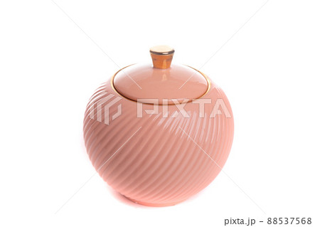 round stylish peach colored porcelain sugar bowl on white isolated background round stylish peach colored porcelain sugar bowl on white isolated background 88537568