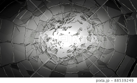 Pieces of glass broken or cracked on spot light vignette background 88539249