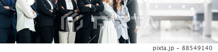 Successful business people standing together widen out Successful business people standing together widen out 88549140
