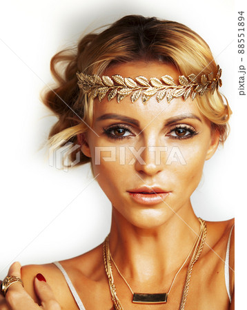 young blond woman dressed like ancient greek godess, gold jewelry closeup isolated, beautiful girl hands manicured red nails young blond woman dressed like ancient greek godess, gold jewelry closeup isolated, beautiful girl hands manicured red nails 88551894
