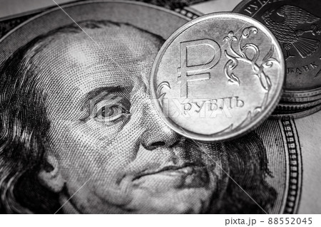 Ruble coin vs US dollar bill, money of Russia and USA Ruble coin vs US dollar bill, money of Russia and USA 88552045