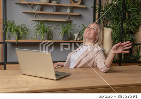The girl at the computer business lady, the concept of a torgitologist gender equality job shopping freelance worker equality, for search glasses in study for modern workplace, hands notebook. Tablet 88553591