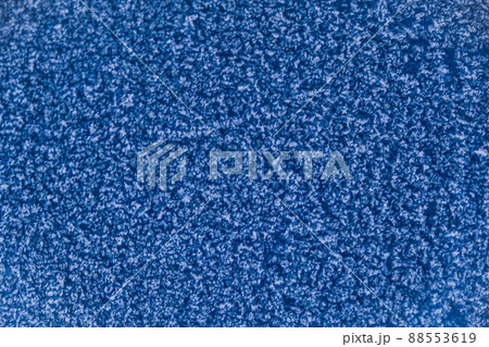 The blue wall is covered with snow patterns. Frost 88553619
