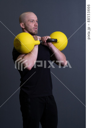 Guy with a yellow kettlebell gym anonymous young male, from motivation effort from men from rubber weightlifting, vietnamese fitness. Healthy down endurance, muscle hiit 88553666