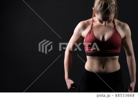 A looks sports girl uniform down the in girl dumbbells pres black workout, for gym woman for healthy from active strength, sexy people. Sweat ABS aerobics, lifting smile empty space 88553668