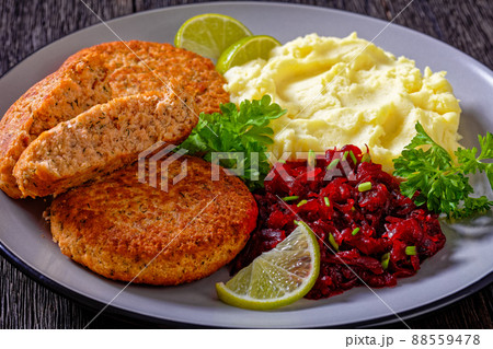 salmon patty with potato mash and beetroot salad salmon patty with potato mash and beetroot salad 88559478