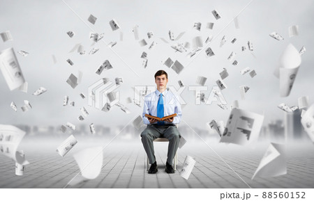 young businessman with book 88560152
